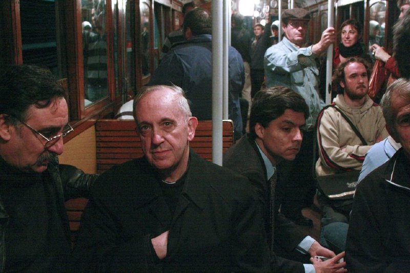The future Pope Francis, Cardinal Jorge Mario Bergoglio, riding the Buenos Aires subway.